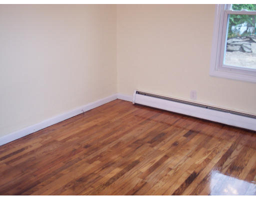 100 Slater Avenue Springfield, MA 01119 - Photo 4 of 12 a view of empty room with wooden floor