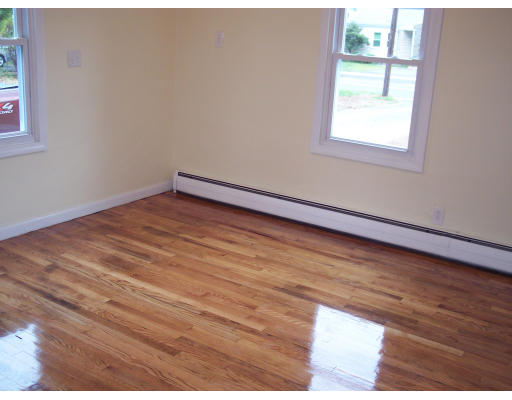 100 Slater Avenue Springfield, MA 01119 - Photo 5 of 12 a view of wooden floor and windows in a room
