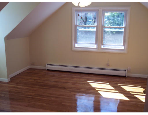 100 Slater Avenue Springfield, MA 01119 - Photo 9 of 12 a view of a room with wooden floor and a window