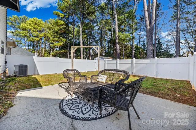 a view of swimming pool with a patio