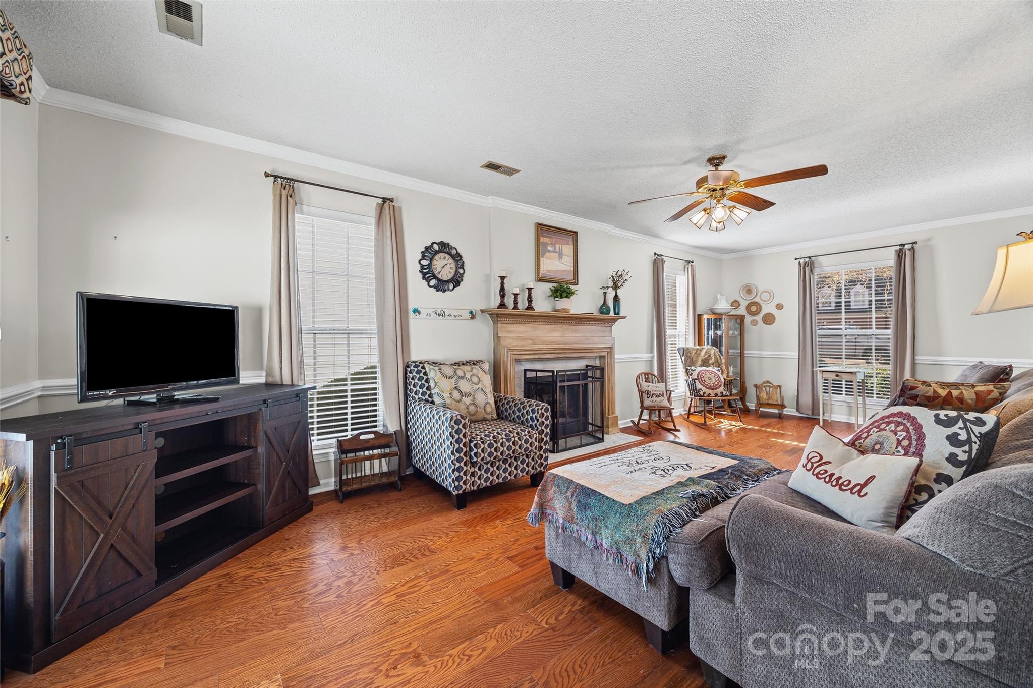 1337 Windsor Ridge Drive Rock Hill, SC 29732 - Photo 5 of 25 a living room with furniture and a flat screen tv