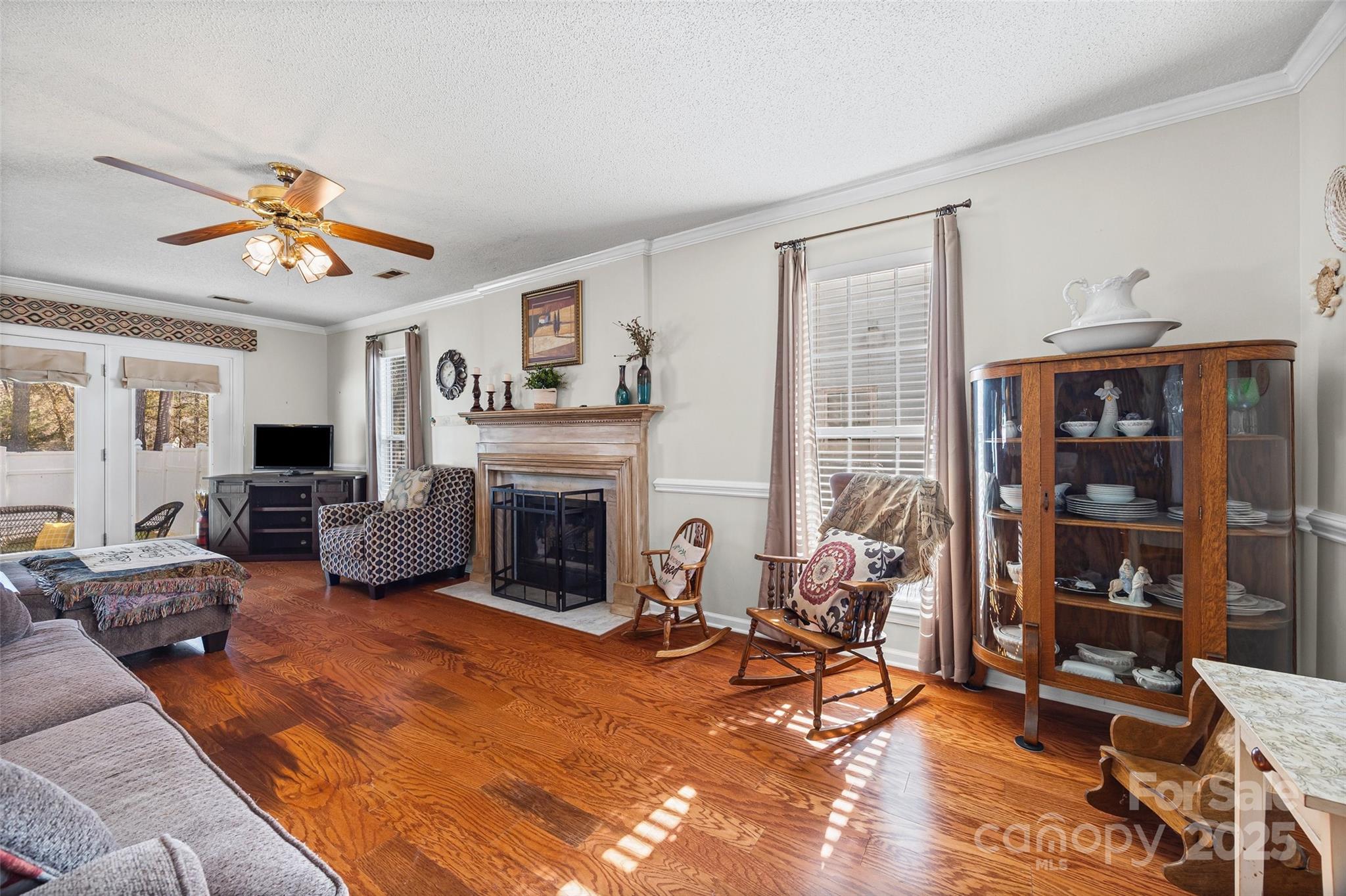 1337 Windsor Ridge Drive Rock Hill, SC 29732 - Photo 6 of 25 a living room with furniture a fireplace and a large window