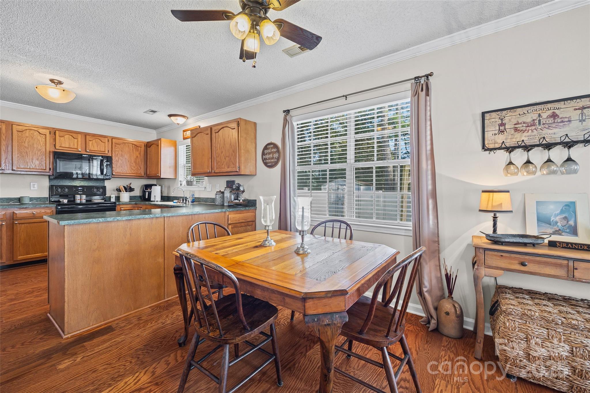 1337 Windsor Ridge Drive Rock Hill, SC 29732 - Photo 9 of 25 a dining table with chairs and window