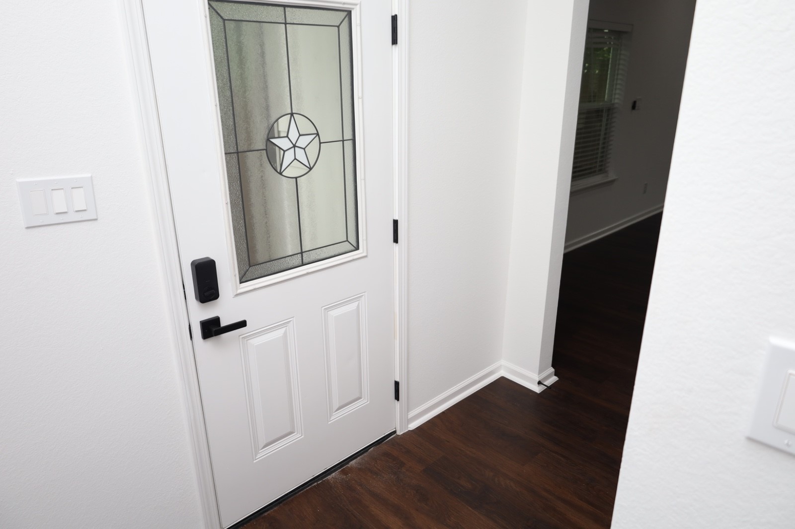 6614 Foster Street Houston, TX 77021 - Photo 2 of 15 a view of a hallway with wooden floor