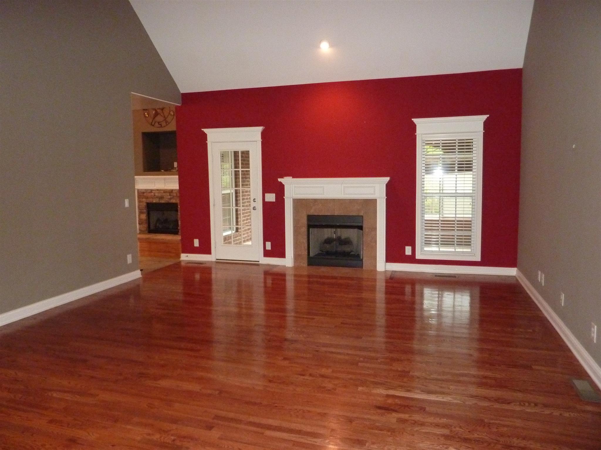 246 Ridgewater Way Mount Juliet, TN 37122 - Photo 8 of 29 a view of empty room with wooden floor and fireplace