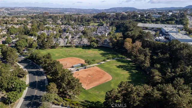 a view of a park with swings