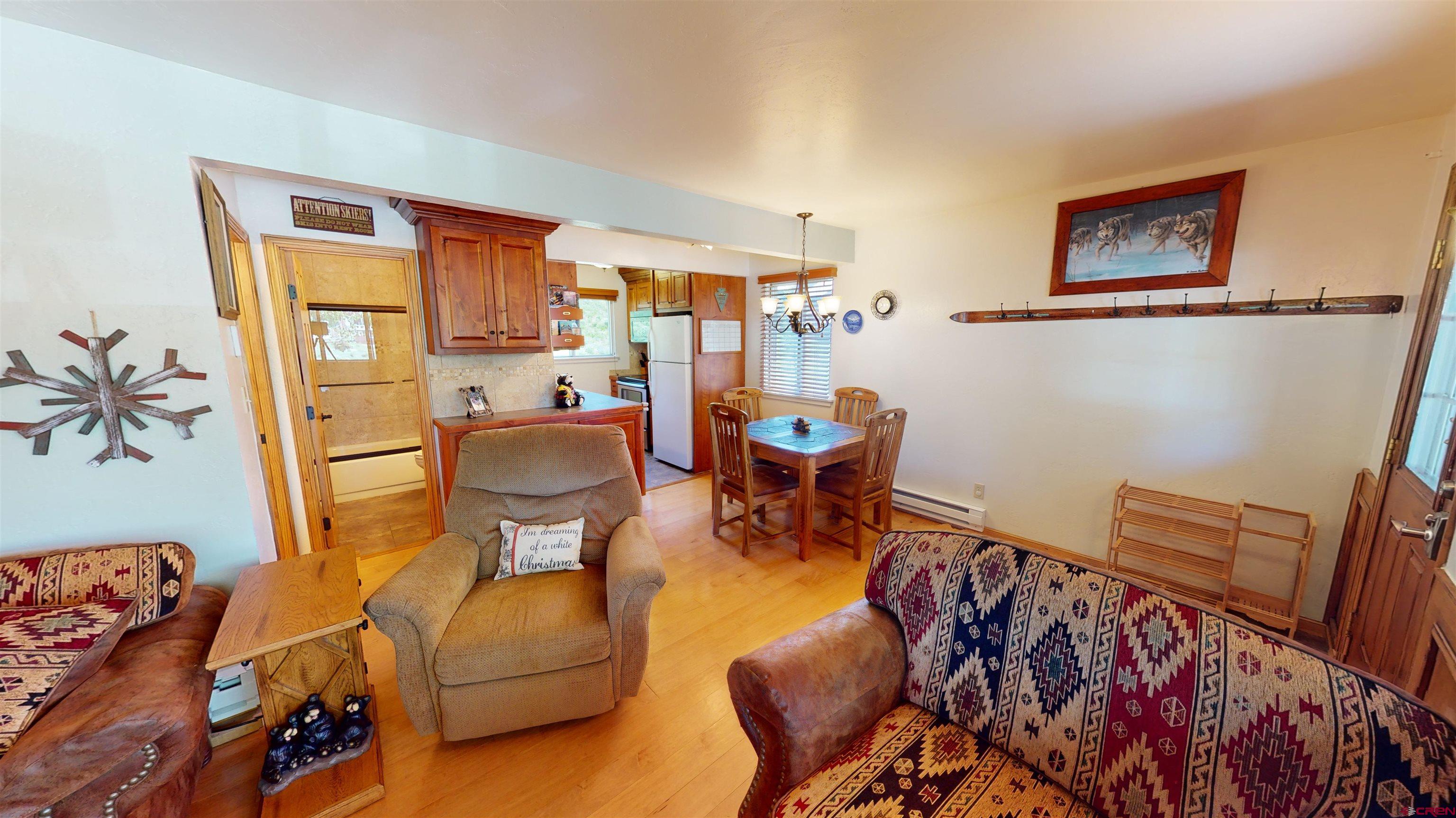 18 Crystal Road, Unit 3B Crested Butte, CO 81225 - Photo 4 of 20 a living room with furniture and a window