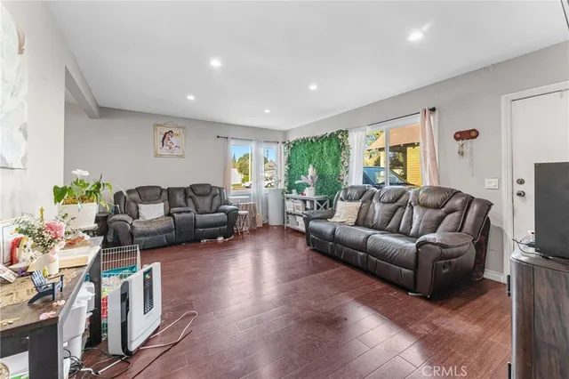 a kitchen with stainless steel appliances a refrigerator and a stove