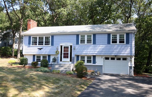 14 Patriot Road Burlington, MA 01803 - Photo 1 of 1 a front view of a house with a yard