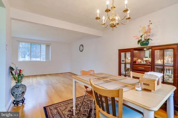 a kitchen with kitchen island a counter top space appliances and a counter space