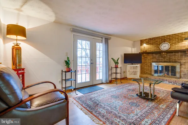 a work place with a couch and window