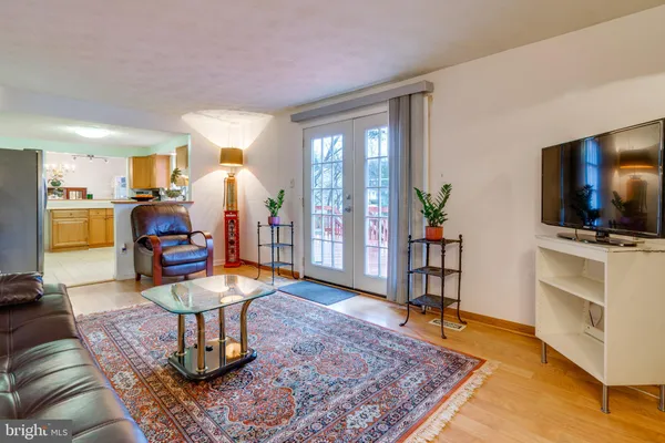 a view of a livingroom with furniture and front door