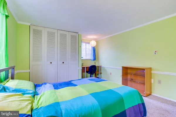 a view of a deck with wooden floor and outdoor seating