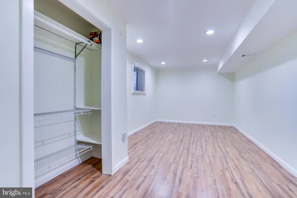 a view of yard with swimming pool and trees