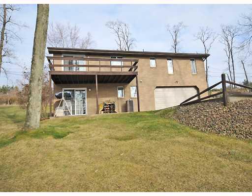 114 Fulton Road Canonsburg, PA 15317 - Photo 14 of 15 Exterior Back. Two car garage and spacious turning court, patio and deck, large rear yard, 1/2 acre lot.