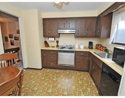 Kitchen. Eat in kitchen with microwave, drop-in stove and dishwasher