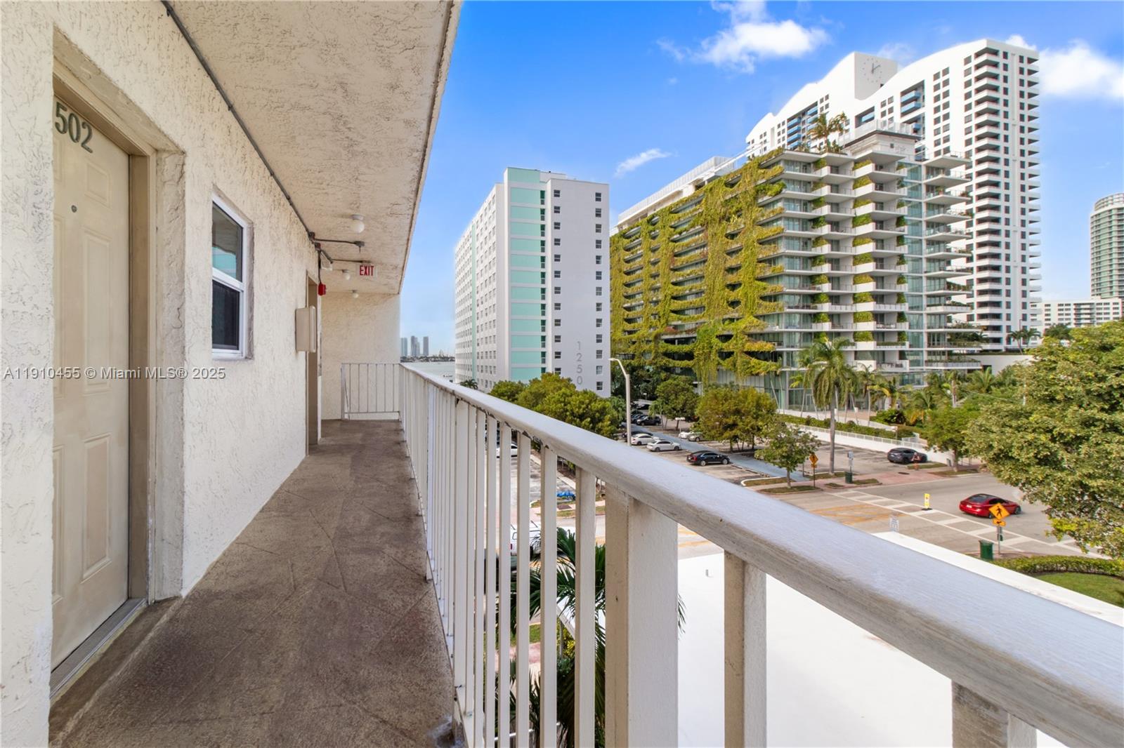 1245 West Avenue, Unit 502 Miami Beach, FL 33139 - Photo 15 of 17 a view of balcony with furniture