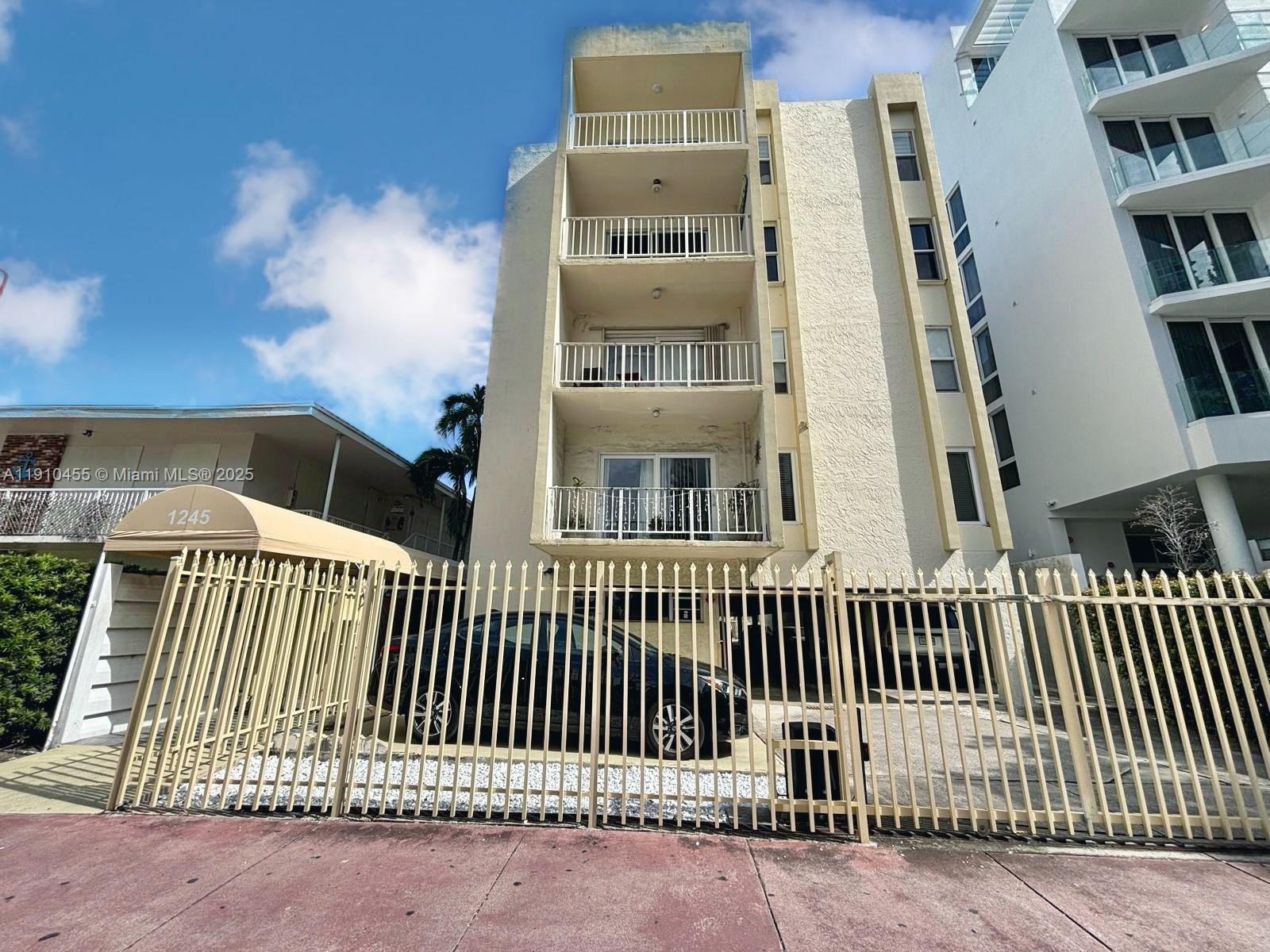 1245 West Avenue, Unit 502 Miami Beach, FL 33139 - Photo 17 of 17 a view of a balcony with a small yard