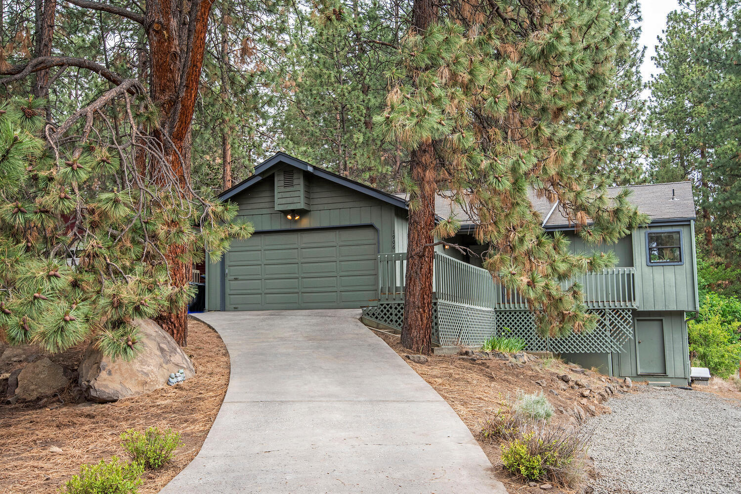 1906 Southwest Forest Ridge Avenue Bend, OR 97702 - Photo 1 of 19 Front driveway and entrance