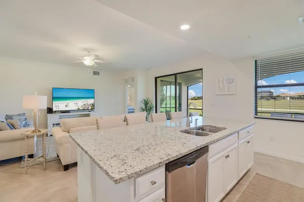 a kitchen with granite countertop lots of counter top space