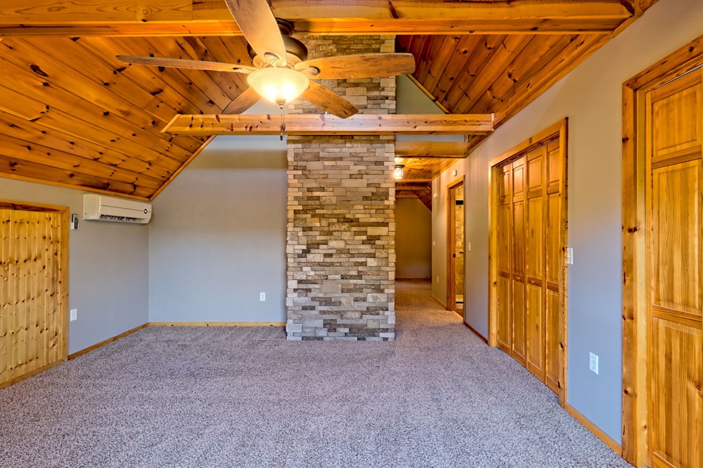 206 Peckerwood Road Hayesville, NC 28904 - Photo 30 of 75 Primary Bedroom, I would use this room as the primary.. the private owners den/ bonus/flex is on same floor/ Good closet space. This room has its own private deck presently screened with a catio!