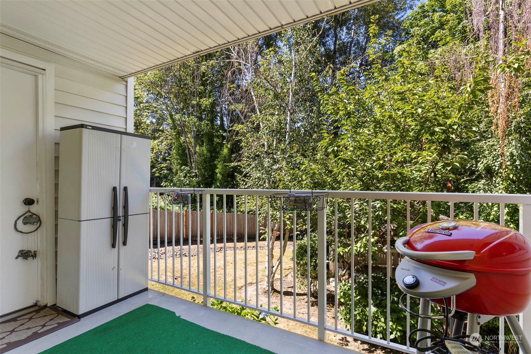 949 Aberdeen Avenue Northeast, Unit E216 Renton, WA 98056 - Photo 19 of 23 a view of a chairs and table in the balcony