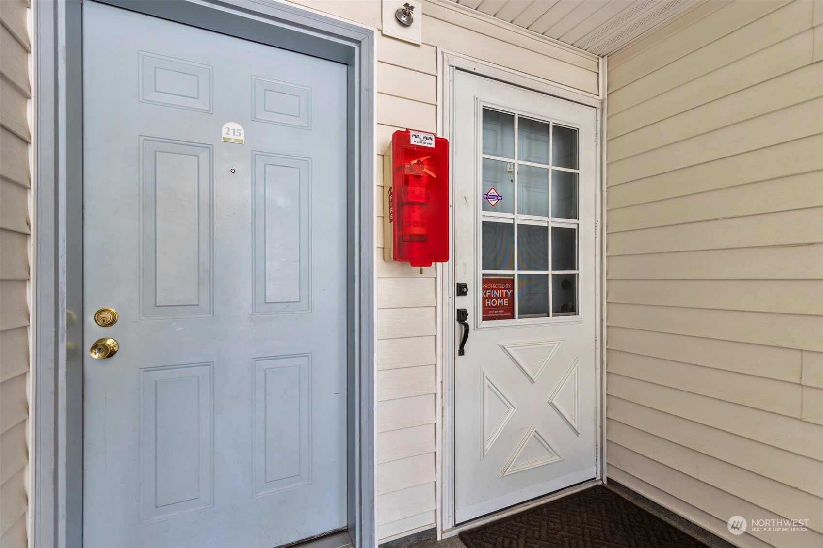 949 Aberdeen Avenue Northeast, Unit E216 Renton, WA 98056 - Photo 4 of 23 a view of front door of house