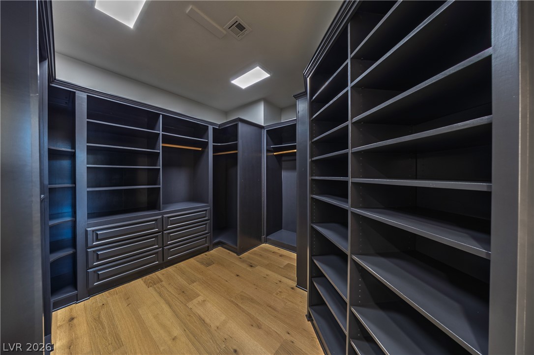 8800 Lusso Las Vegas, NV 89134 - Photo 52 of 85 Walk in closet featuring light wood finished floors