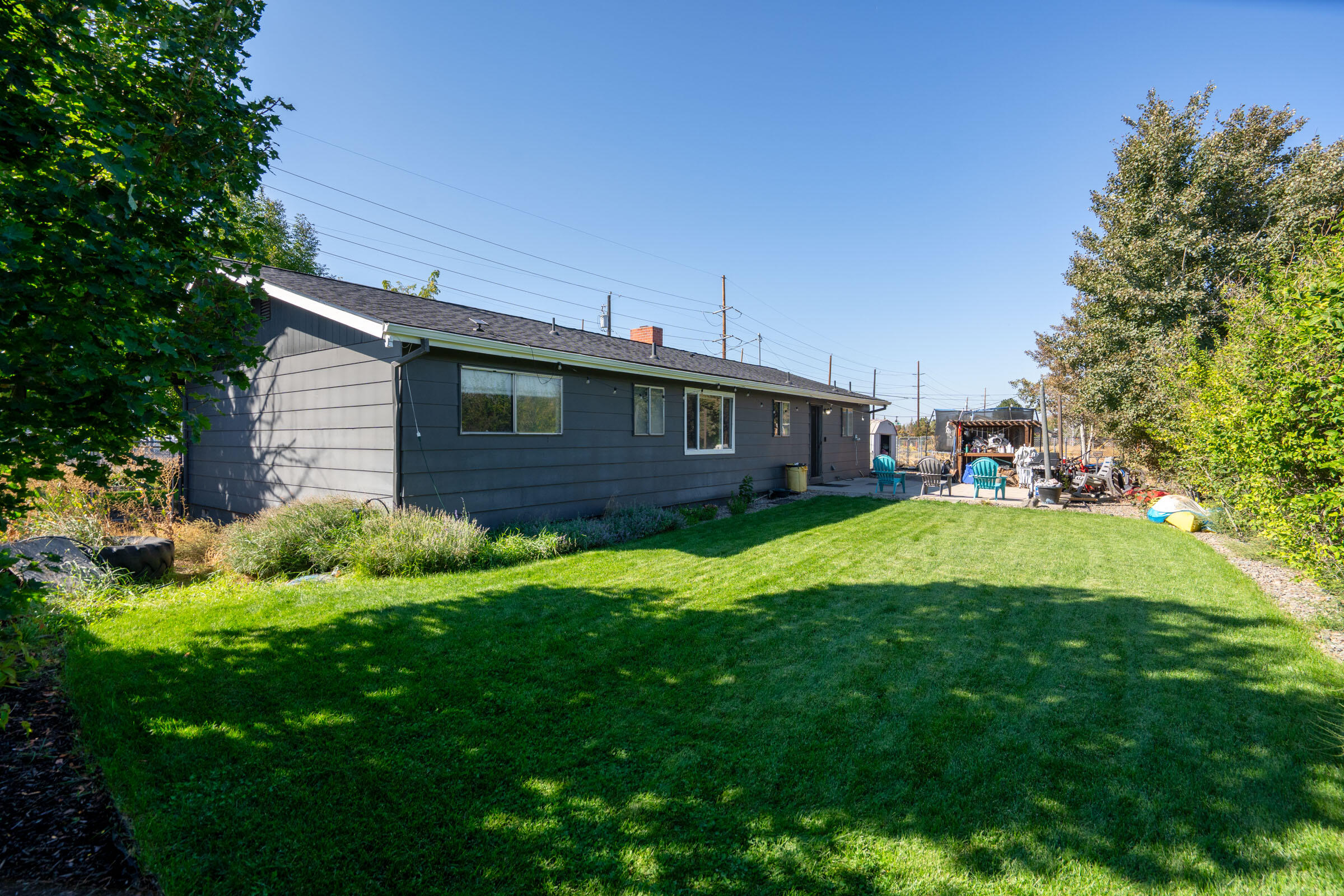 664 Southwest 35th Street Redmond, OR 97756 - Photo 17 of 19 a view of an house with backyard space and garden