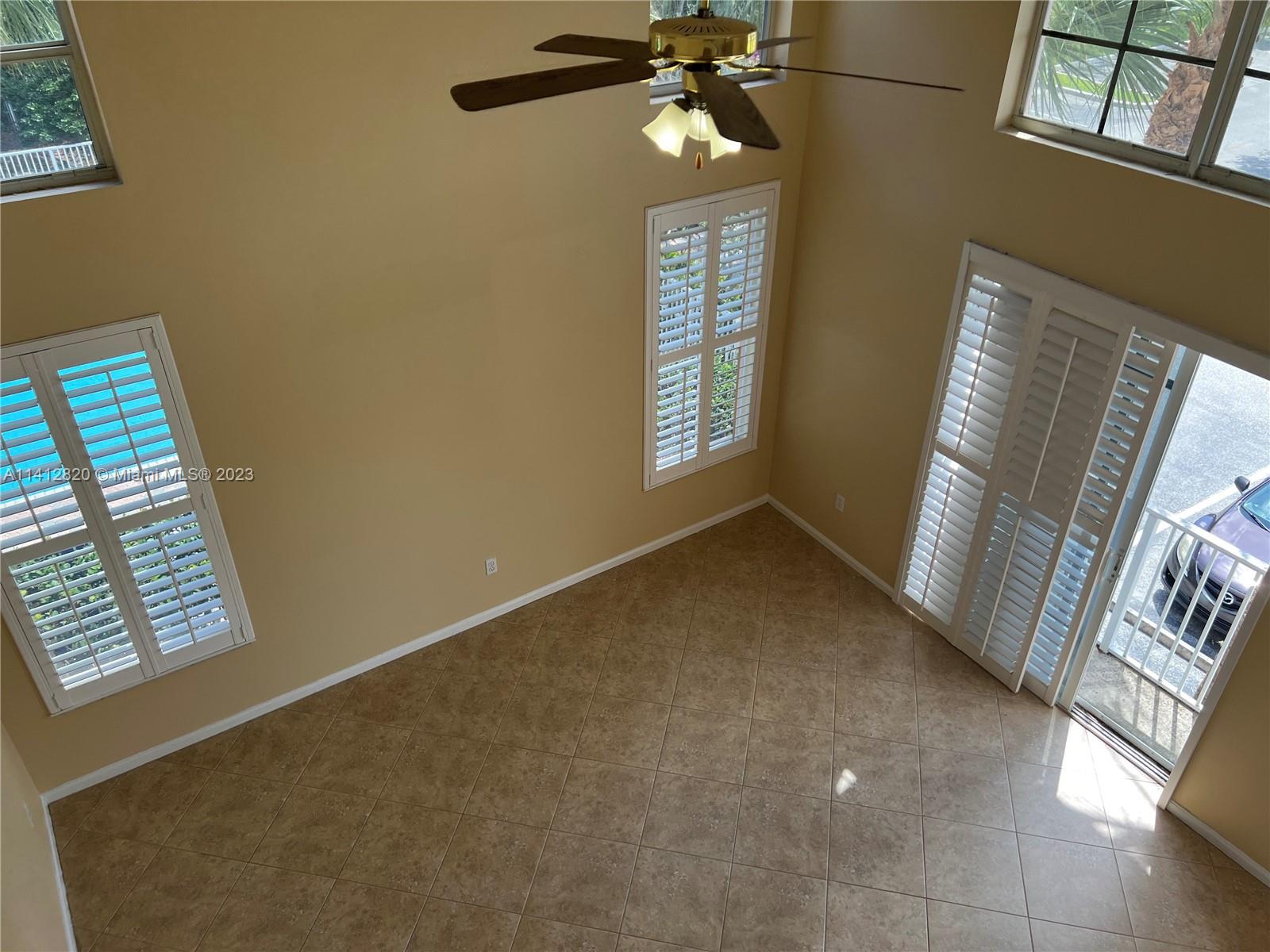 4812 Central Boulevard, Unit 20 Jupiter, FL 33458 - Photo 9 of 24 a view of an empty room with a window