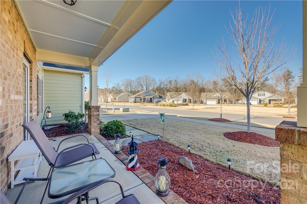1782 Still River Way Fort Mill, SC 29708 - Photo 3 of 42 a view of a porch with furniture and a yard