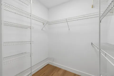 a view of a room with racks on the wall