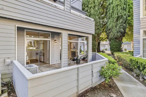 a view of house with outdoor space and porch