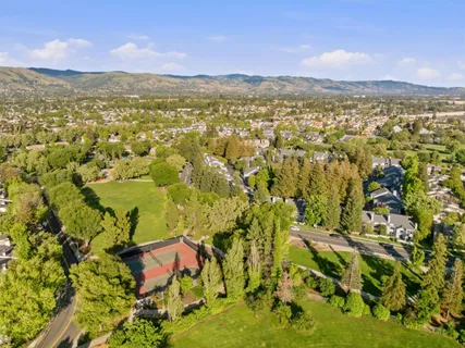 a view of city and green space