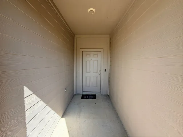 a view of a livingroom with a hallway