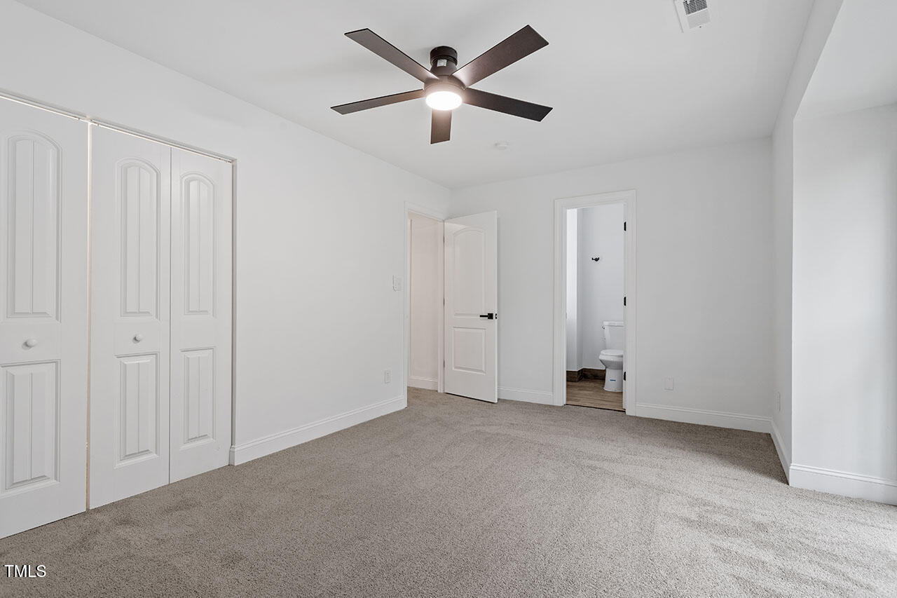 1016 North Bend Drive Raleigh, NC 27609 - Photo 19 of 36 a view of an empty room