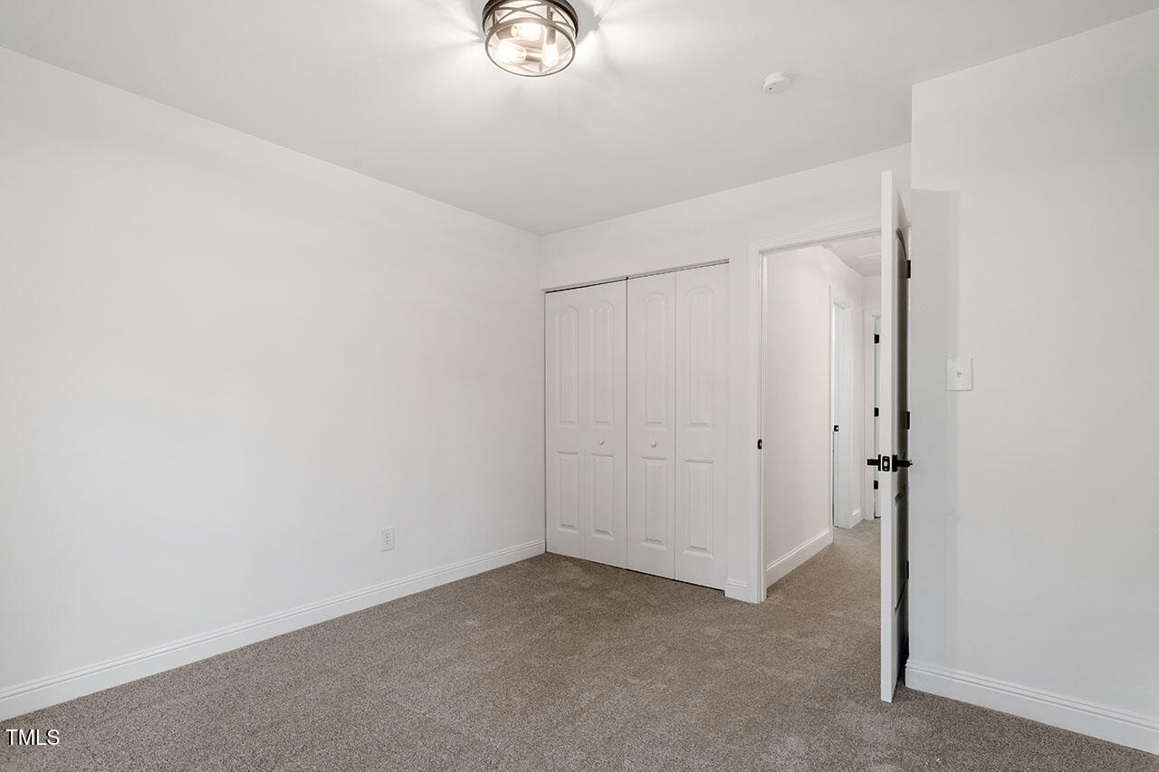 1016 North Bend Drive Raleigh, NC 27609 - Photo 21 of 36 a view of an empty room