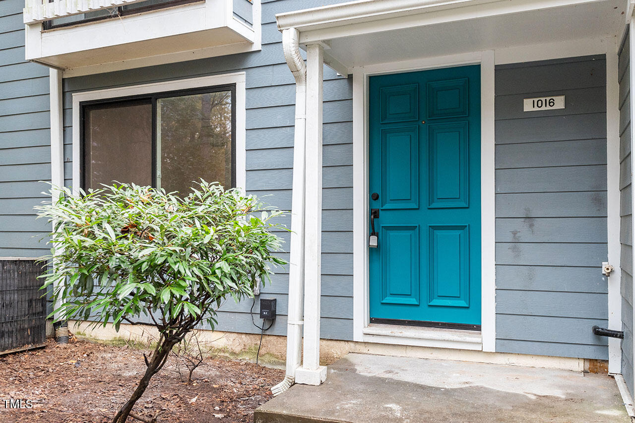 1016 North Bend Drive Raleigh, NC 27609 - Photo 29 of 36 a front view of a house with a garden