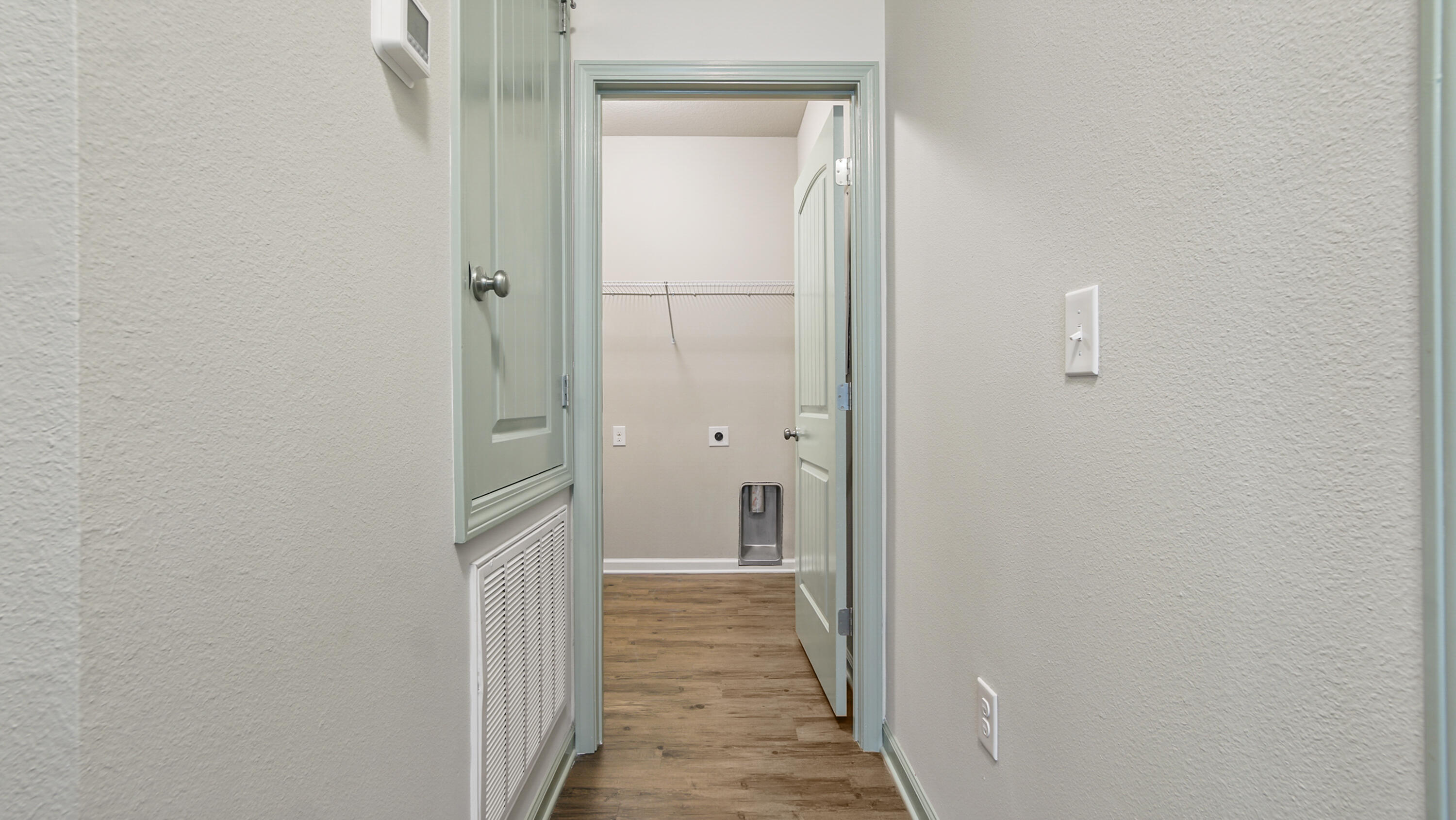 80 Sarona Street Freeport, FL 32439 - Photo 15 of 65 a view of a bathroom from a hallway