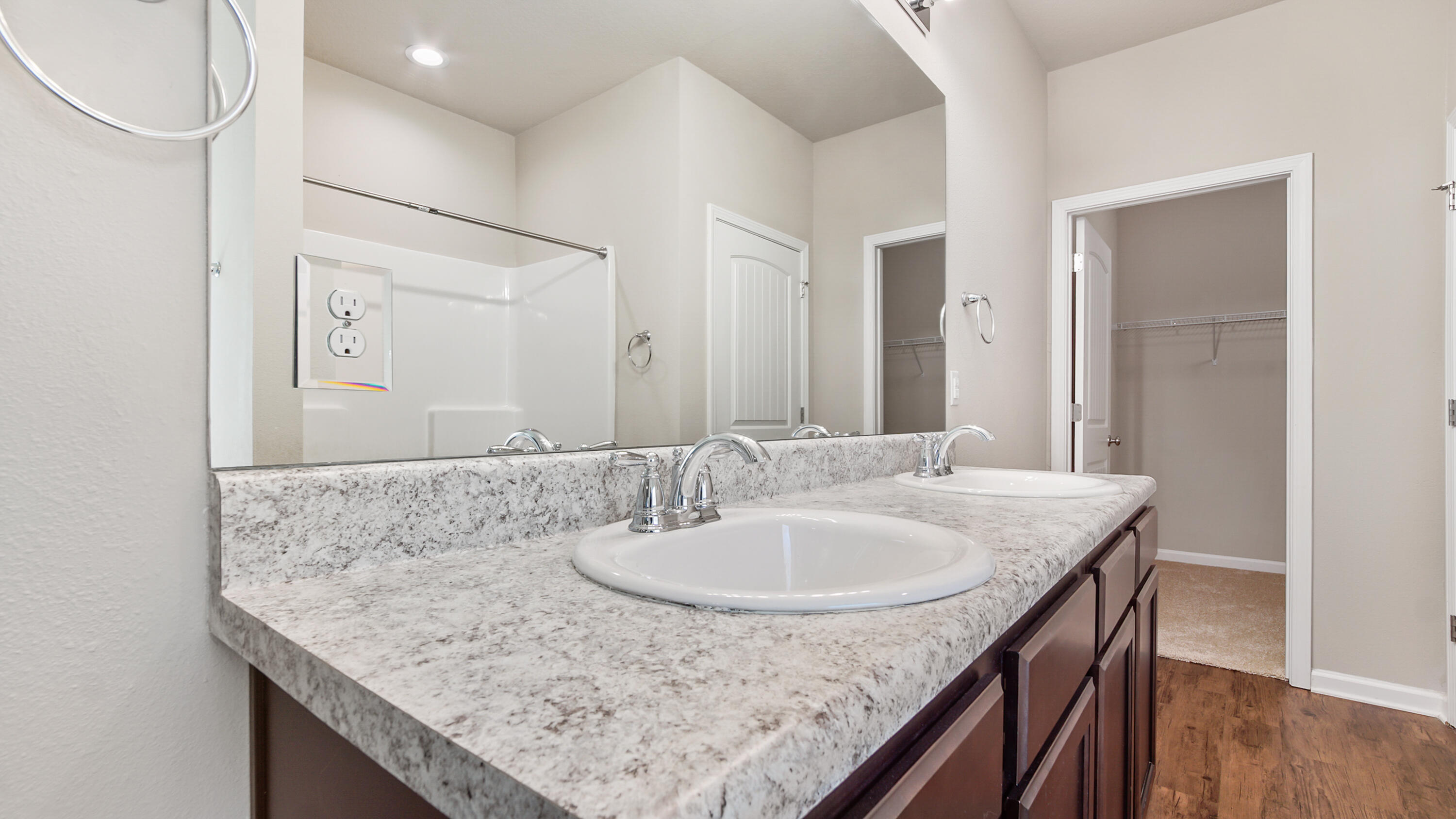 80 Sarona Street Freeport, FL 32439 - Photo 26 of 65 a bathroom with a granite countertop sink and a mirror