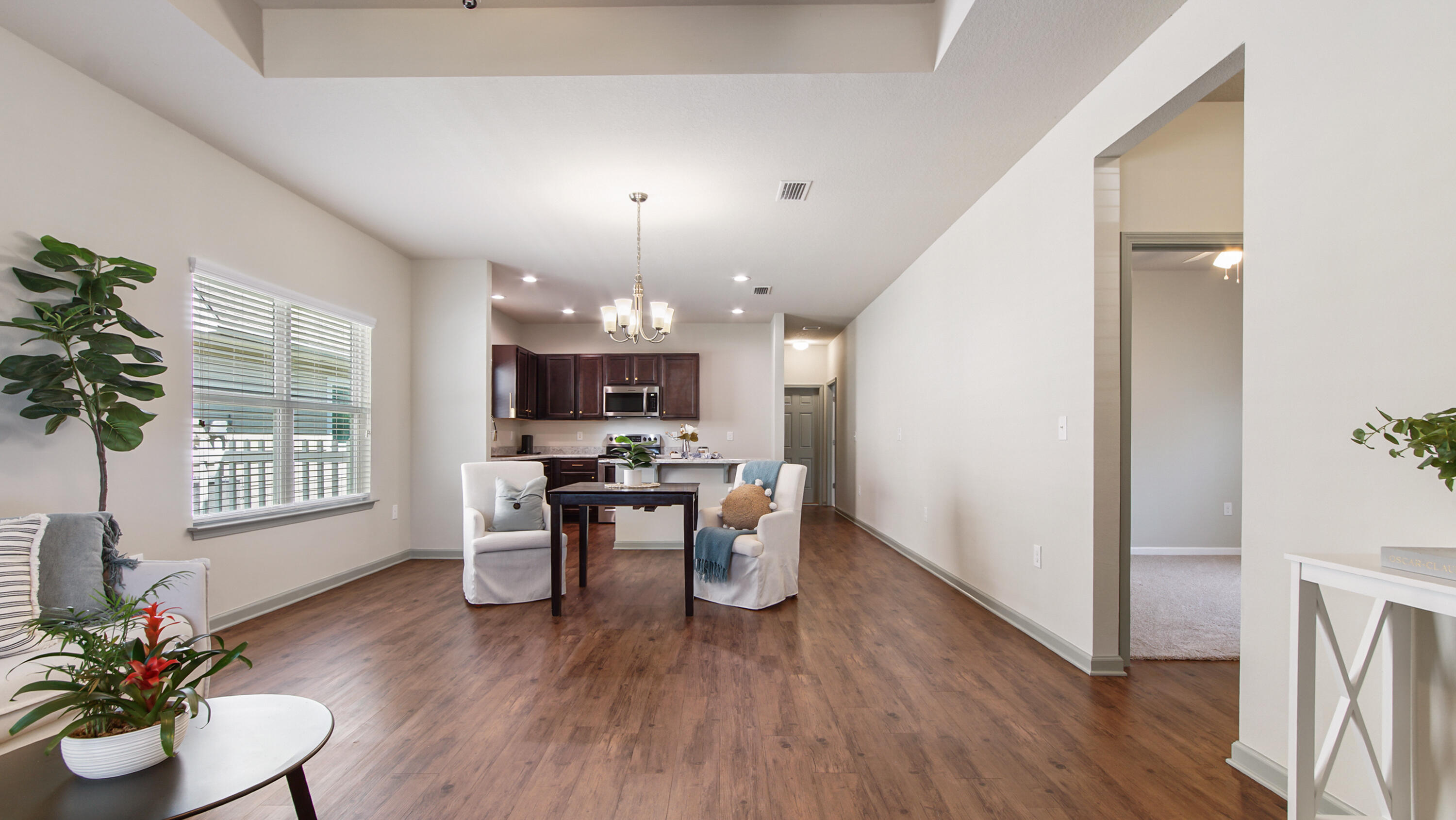 80 Sarona Street Freeport, FL 32439 - Photo 4 of 65 a view of a dining room with furniture window and wooden floor