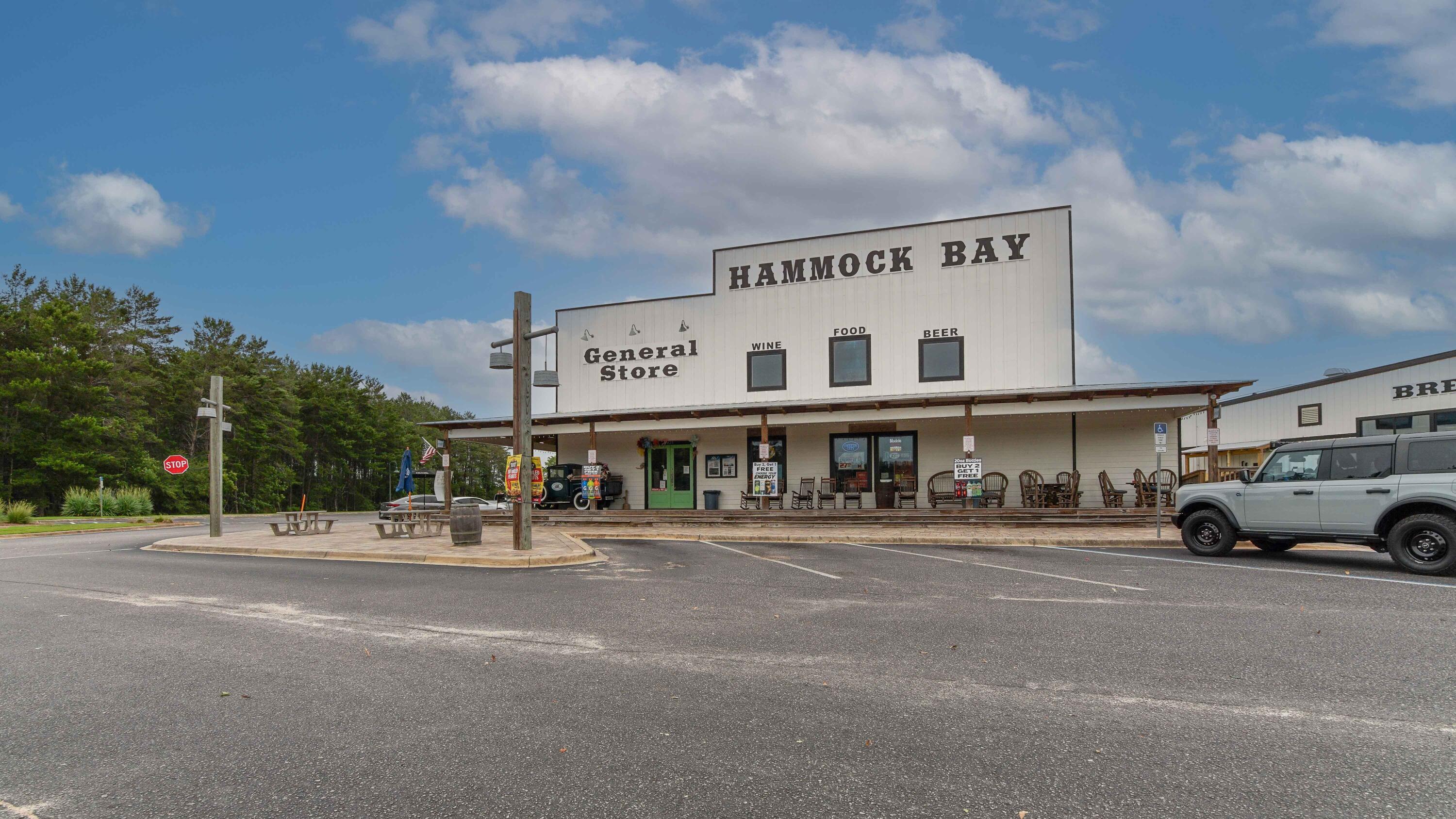 80 Sarona Street Freeport, FL 32439 - Photo 55 of 65 a front view of a building with cars parked