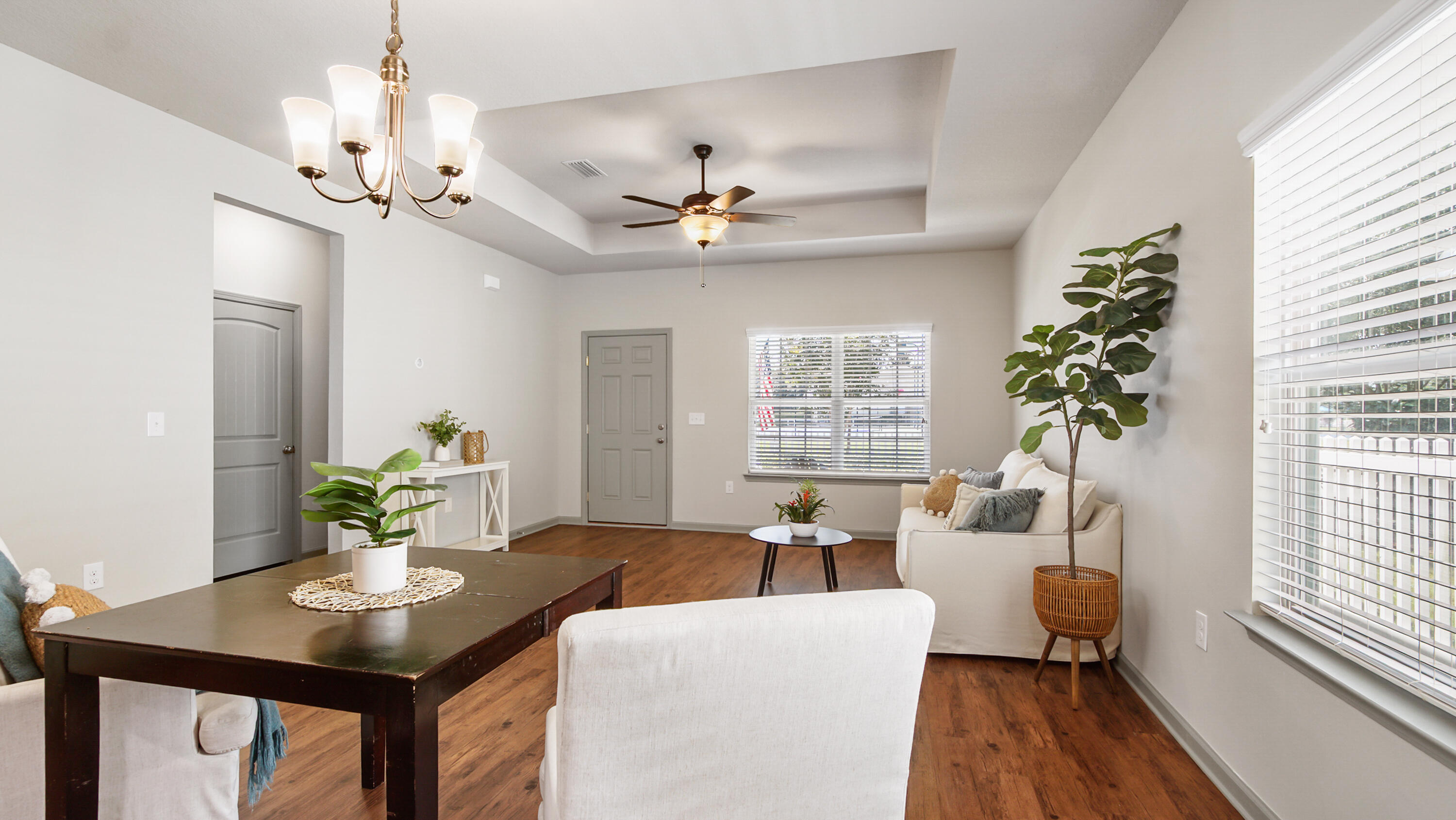 80 Sarona Street Freeport, FL 32439 - Photo 7 of 65 a living room with furniture potted plant and window