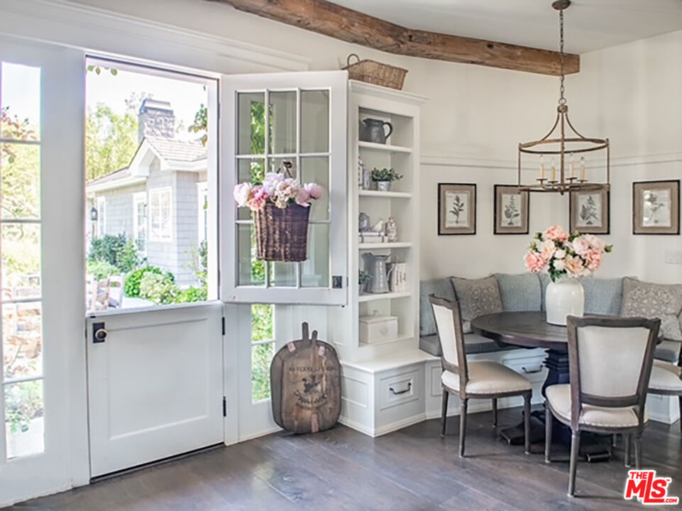 24501 Deep Well Road Hidden Hills, CA 91302 - Photo 3 of 6 a view of a dining room with furniture window and outside view