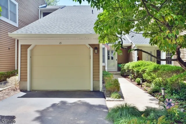 a house with a tree in front of it