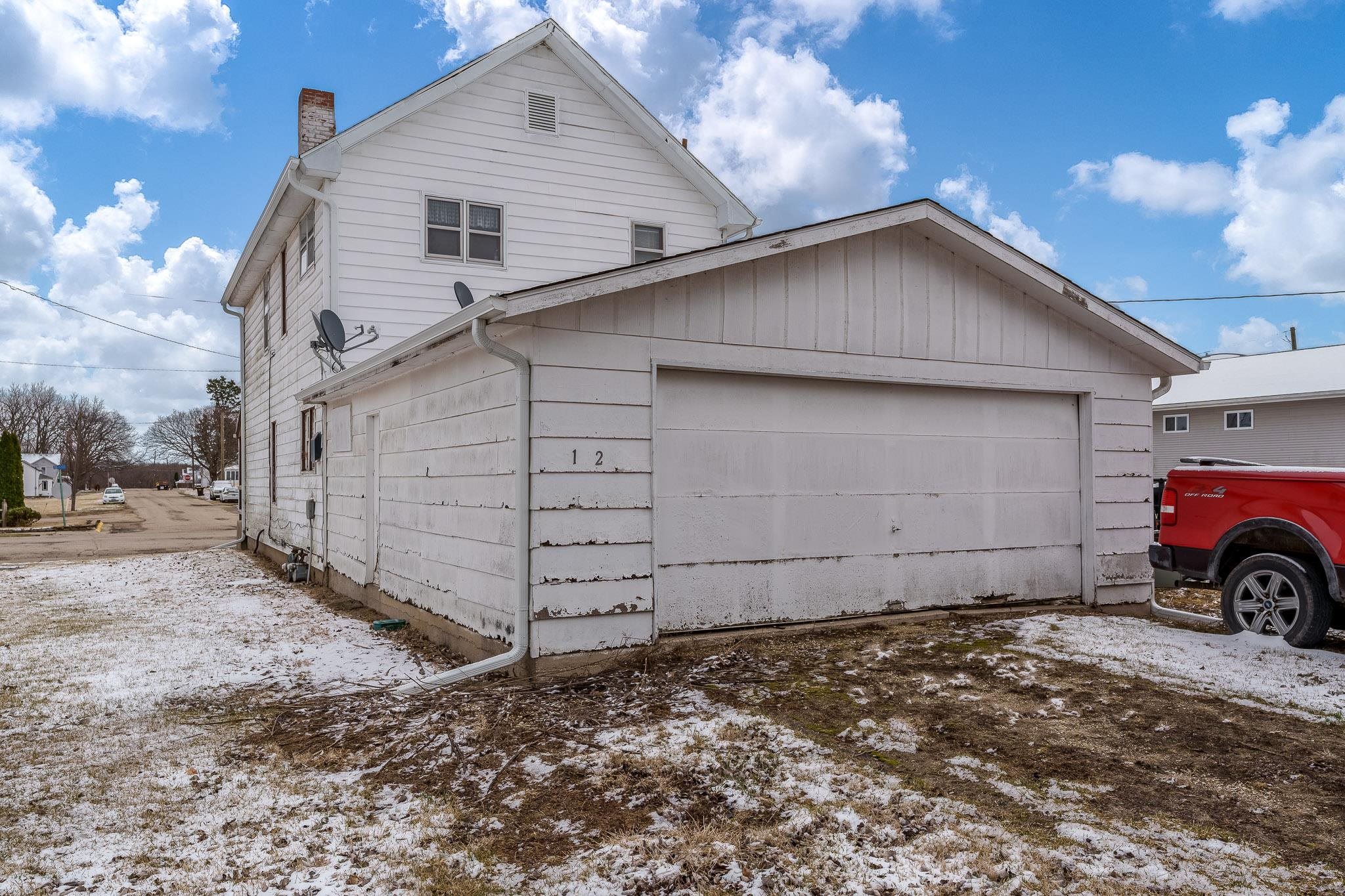 102 North Main Street Leaf River, IL 61047 - Photo 2 of 13 a view of a house with a yard