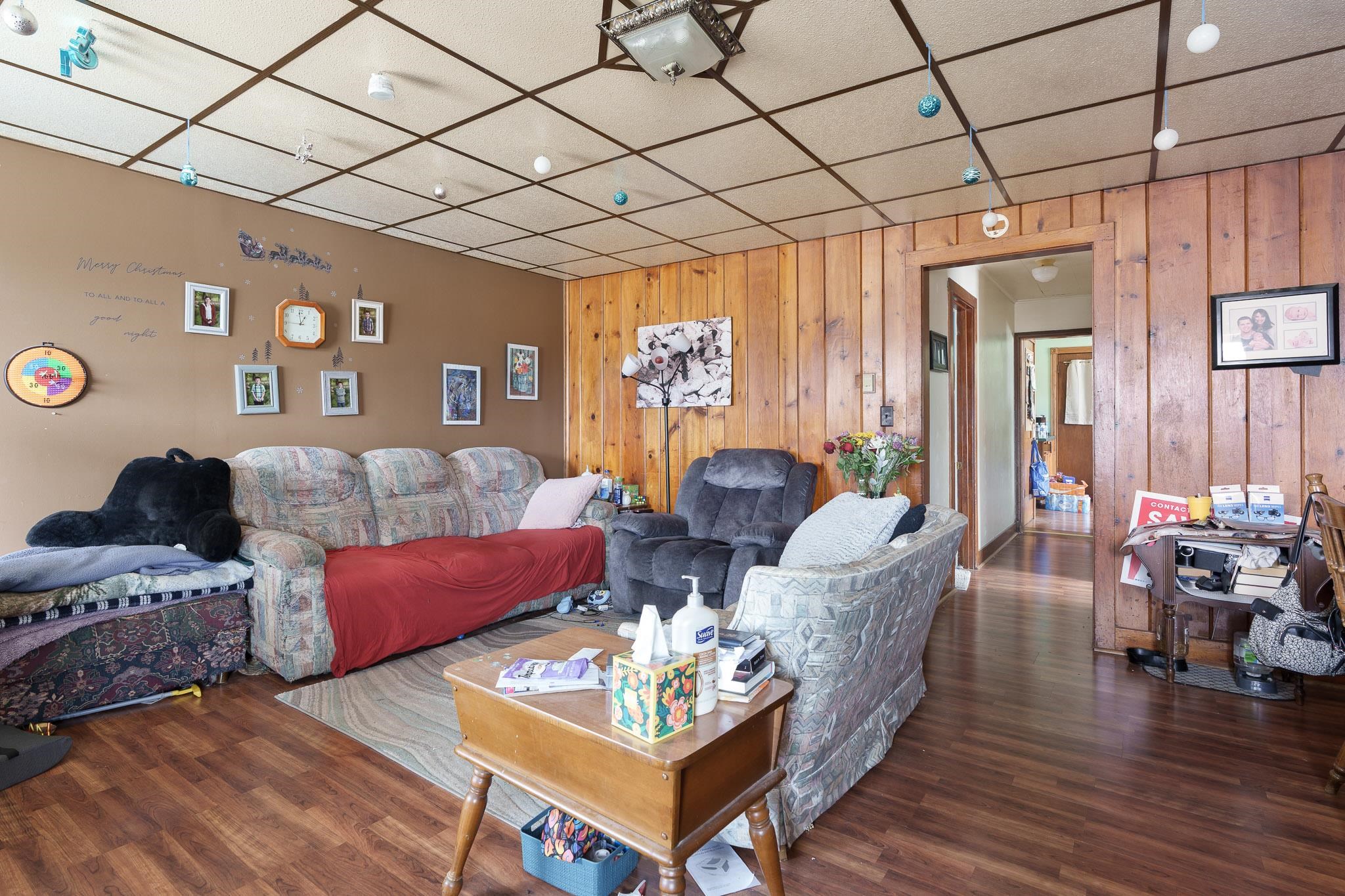 102 North Main Street Leaf River, IL 61047 - Photo 3 of 13 a living room with furniture and wooden floor