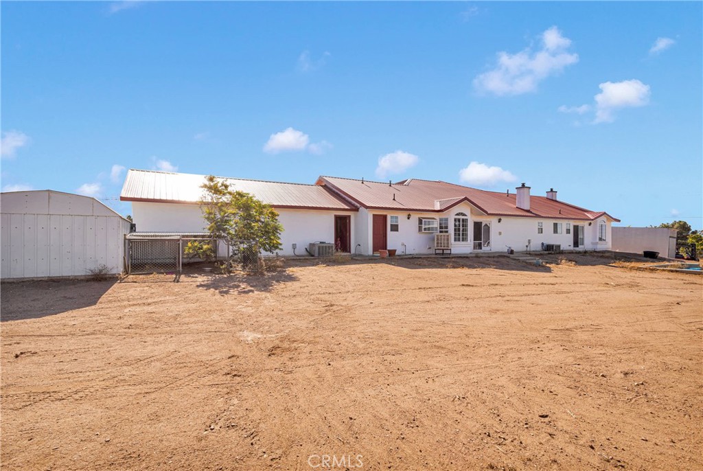 8381 White Road Phelan, CA 92371 - Photo 45 of 59 a front view of a house with a yard
