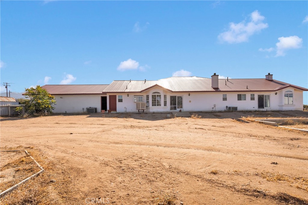8381 White Road Phelan, CA 92371 - Photo 46 of 59 a front view of a house with a yard