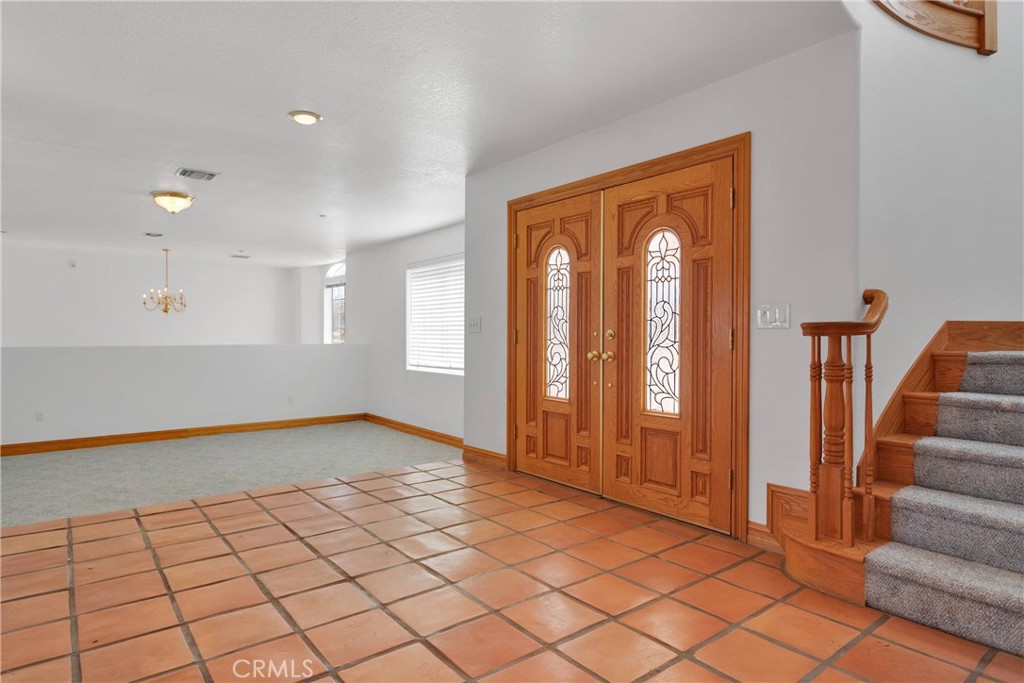 8381 White Road Phelan, CA 92371 - Photo 6 of 59 a view of an entryway with staircase